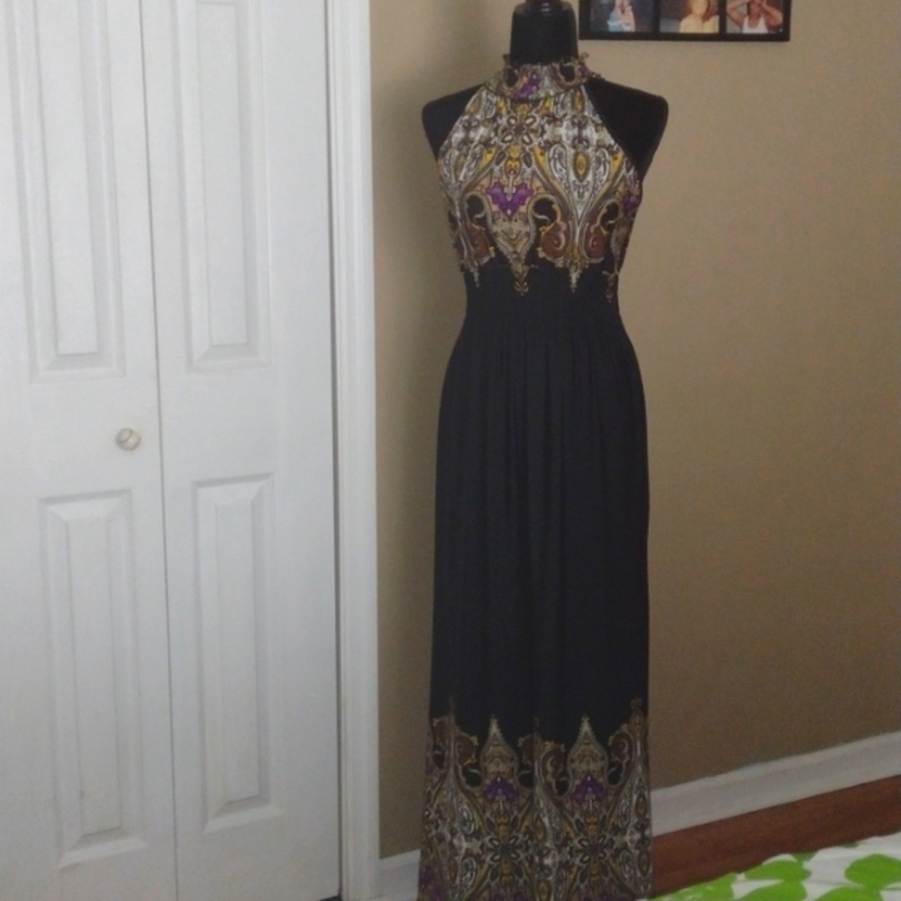 A long sleeveless black dress